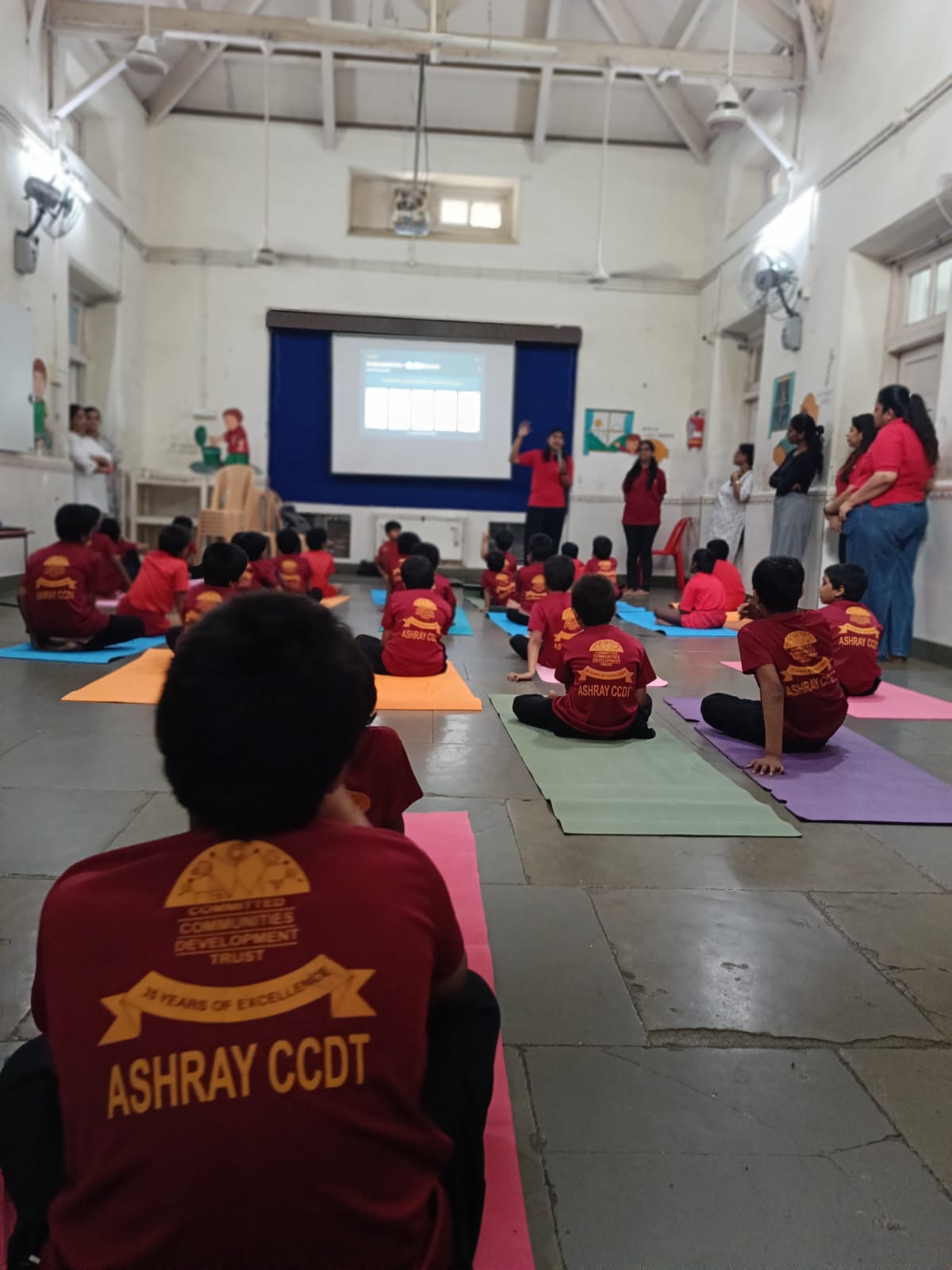 Ashray CCDT team conducting an interactive session with children